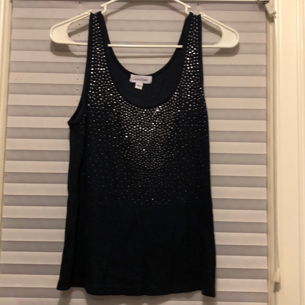 Blue t with ornamentation